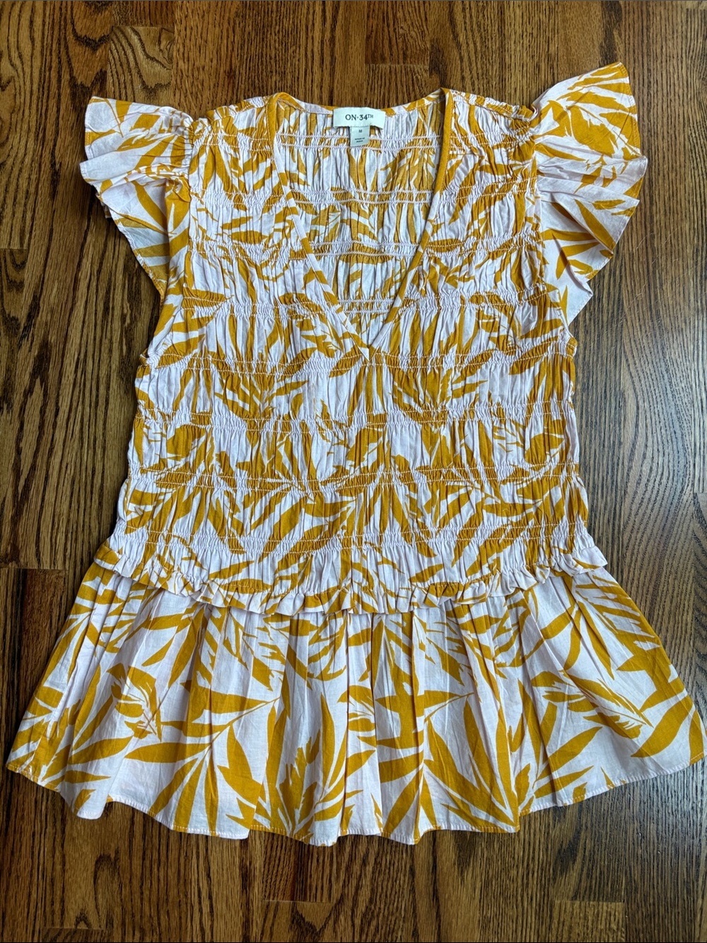 ON 34th Pink and Mustard Leaf-Print Smocked Peplum Blouse
